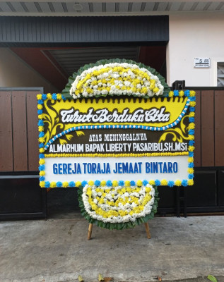 Papan Bunga Duka di Gome